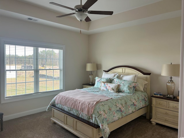 carpeted bedroom with ceiling fan