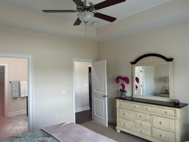 tiled bedroom with ceiling fan