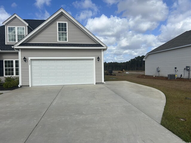 2327 King Farm Rd, Aynor, SC 29511 - exterior space with concrete driveway and central air condition unit
