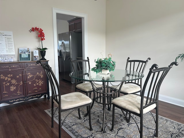 dining area featuring wood-type flooring