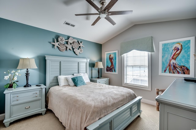 bedroom featuring light colored carpet, ceiling fan, and vaulted ceiling