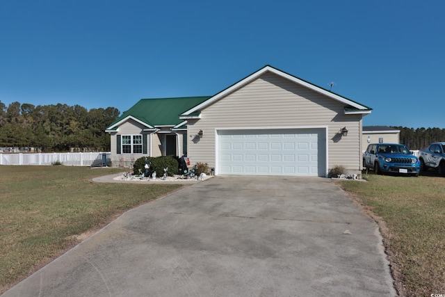 single story home featuring a garage and a front lawn