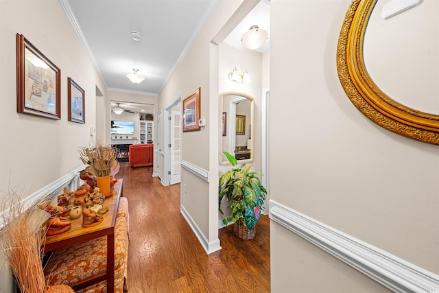 hallway featuring ornamental molding and dark wood-type flooring