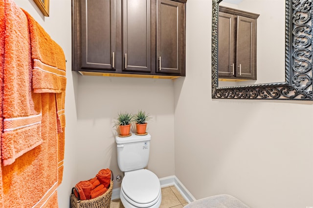 bathroom featuring toilet and tile patterned floors