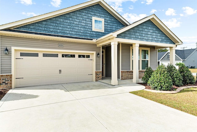 craftsman inspired home featuring a garage