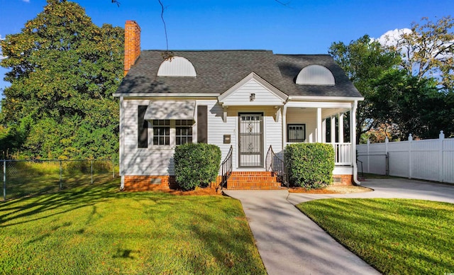 new england style home featuring a front yard, crawl space, fence, and a chimney