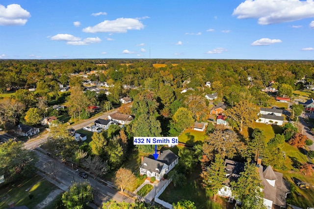 aerial view with a forest view and a residential view