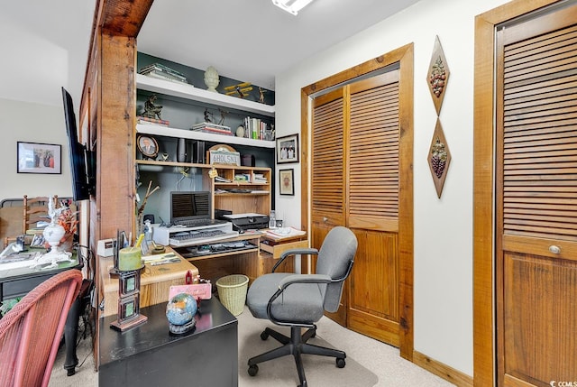 office space with light colored carpet