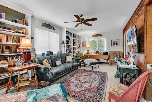 living room featuring ceiling fan and light carpet