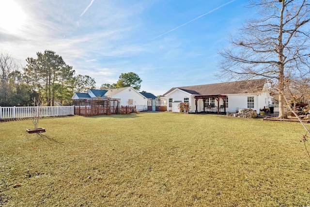 view of yard featuring a fenced backyard and a pergola