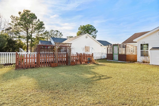 view of yard with fence