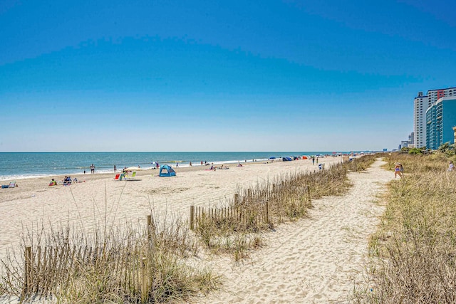 property view of water featuring a beach view