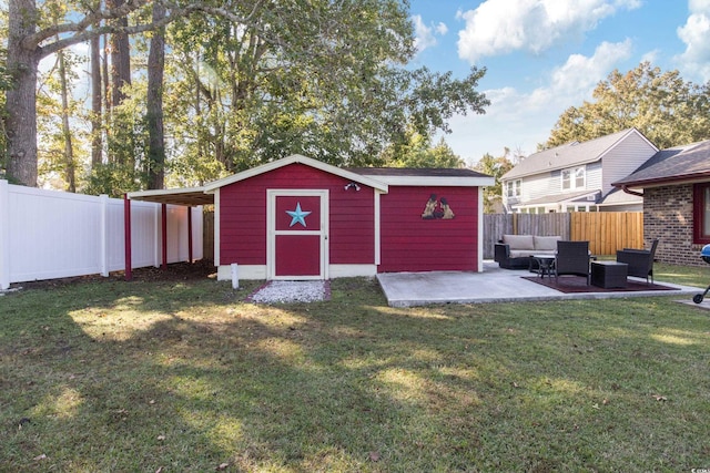 view of outdoor structure with a yard and outdoor lounge area