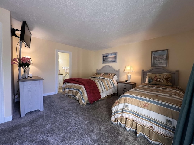 2805 N Ocean Blvd Unit 107, Myrtle Beach, SC 29577 - bedroom with carpet, a textured ceiling, ensuite bath, and baseboards
