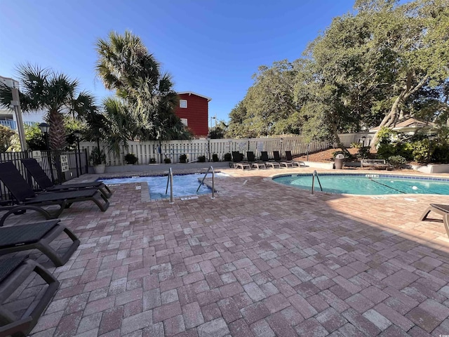 2805 N Ocean Blvd Unit 107, Myrtle Beach, SC 29577 - community pool with a patio area and fence