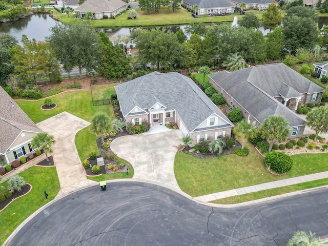 aerial view featuring a residential view and a water view