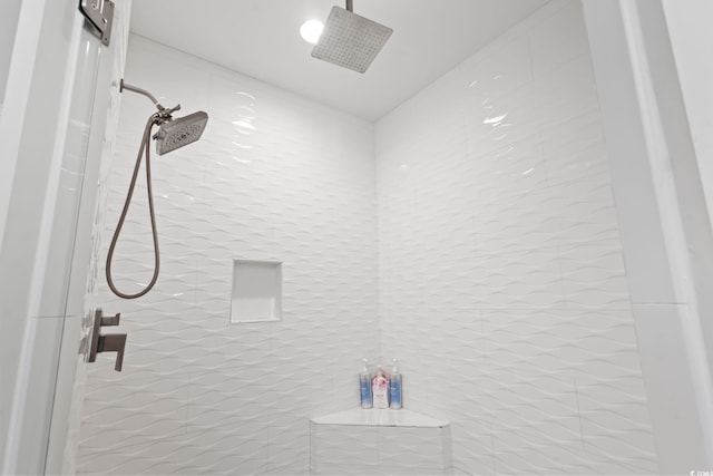 room details featuring a tile shower