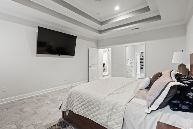 116 Ocean Sands Ct, Myrtle Beach, SC 29579 - bedroom with visible vents, baseboards, a raised ceiling, ornamental molding, and a walk in closet