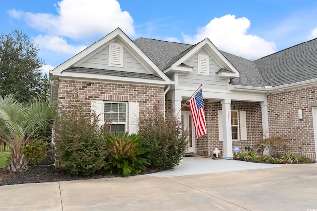 116 Ocean Sands Ct, Myrtle Beach, SC 29579 - view of front of property featuring roof with shingles and brick siding