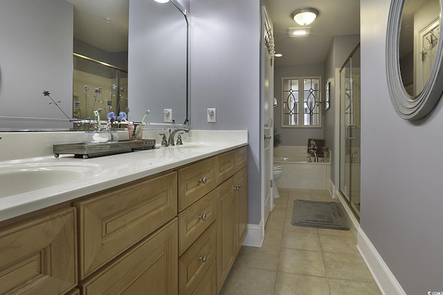 full bathroom featuring tile patterned floors, vanity, independent shower and bath, and toilet