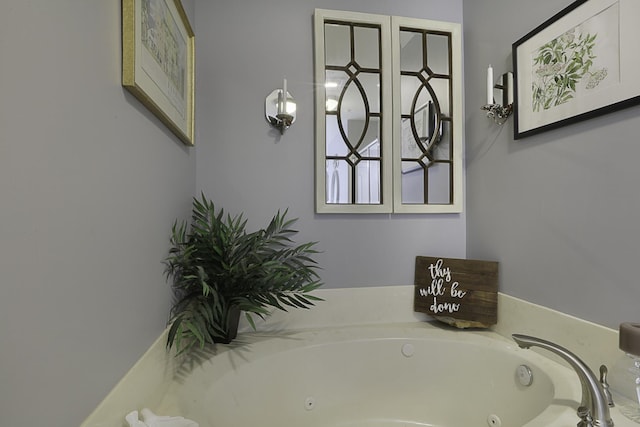 bathroom featuring a tub to relax in