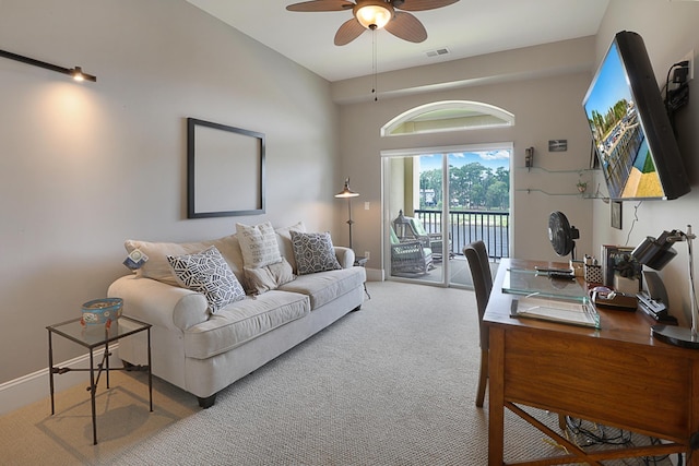 office area featuring ceiling fan and carpet floors