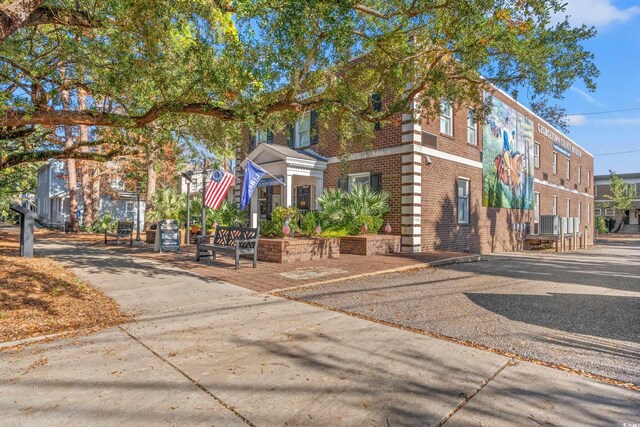 608 Britt St, Georgetown, SC 29440 - view of front facade with brick siding