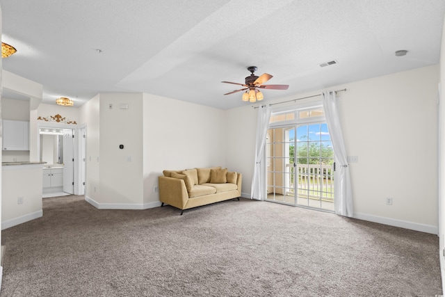 2241 Waterview Dr Unit 437, North Myrtle Beach, SC 29582 - sitting room with carpet flooring, baseboards, ceiling fan, and a textured ceiling