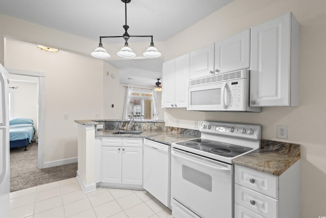 2241 Waterview Dr Unit 437, North Myrtle Beach, SC 29582 - kitchen with white appliances, a sink, white cabinets, a peninsula, and a ceiling fan