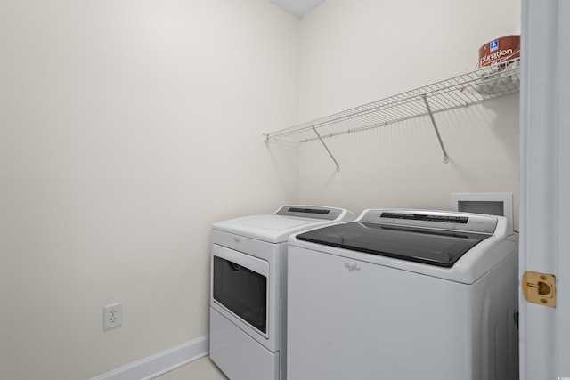 2241 Waterview Dr Unit 437, North Myrtle Beach, SC 29582 - laundry room with washer and clothes dryer and baseboards