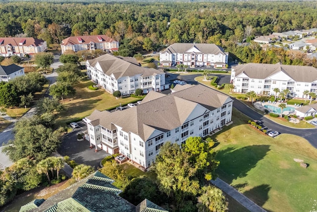 2241 Waterview Dr Unit 437, North Myrtle Beach, SC 29582 - aerial perspective of suburban area with a heavily wooded area