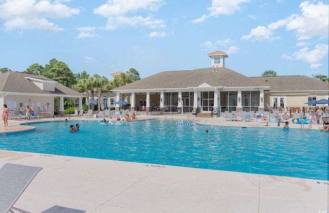 view of swimming pool featuring a patio