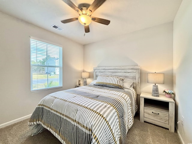 bedroom with light colored carpet and ceiling fan