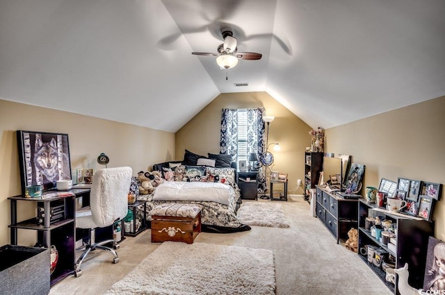 bedroom featuring ceiling fan, vaulted ceiling, and light carpet