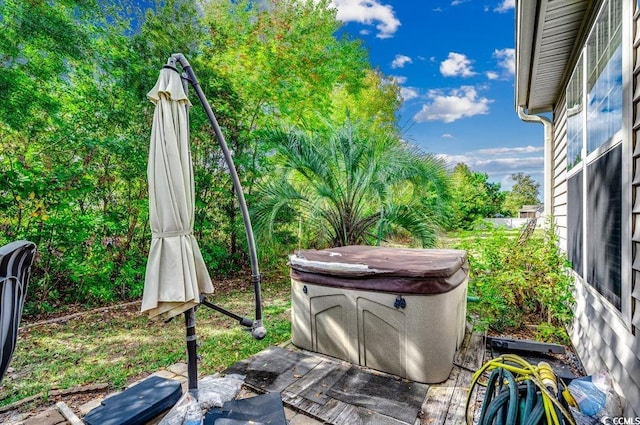 view of patio / terrace featuring a hot tub