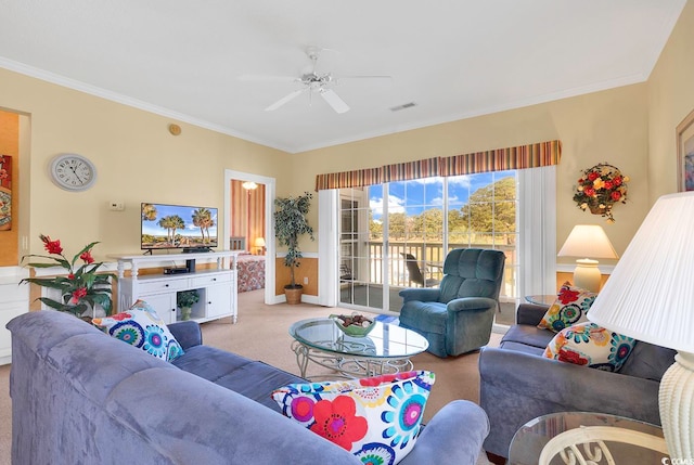 carpeted living room with ceiling fan and crown molding