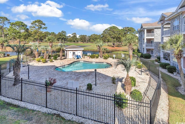 view of swimming pool with a patio area