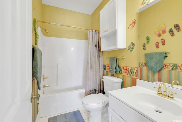 full bathroom featuring toilet, vanity, tile patterned floors, and shower / tub combo