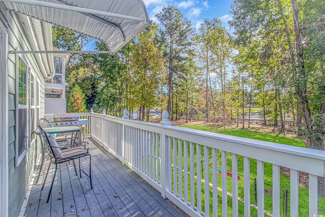 wooden deck with grilling area