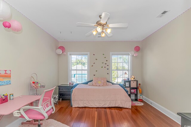 bedroom with wood-type flooring and ceiling fan