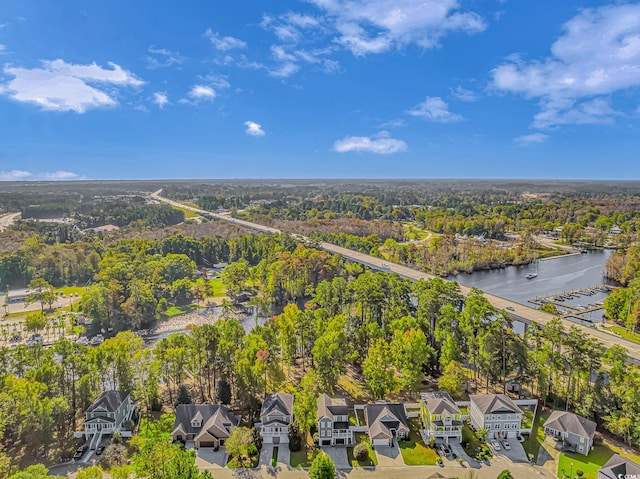 bird's eye view with a residential view and a water view