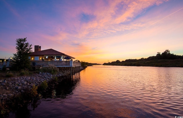 property view of water with a gazebo