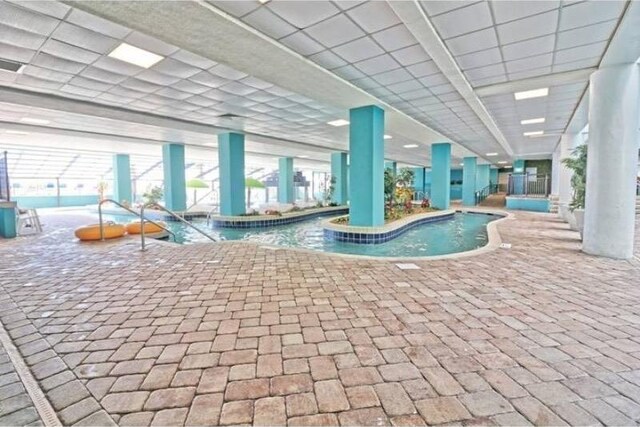 1501 Ocean Blvd S Unit 422, Myrtle Beach, SC 29577 - indoor pool with a patio area