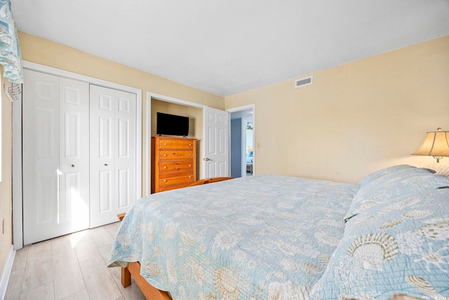 bedroom with light wood-type flooring