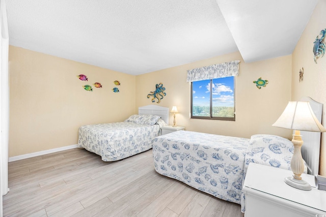 bedroom featuring light hardwood / wood-style flooring