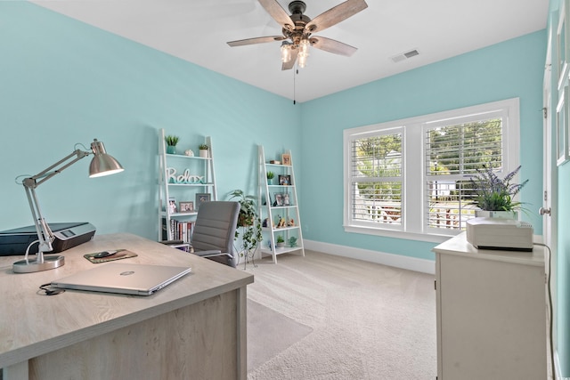 home office with light colored carpet and ceiling fan