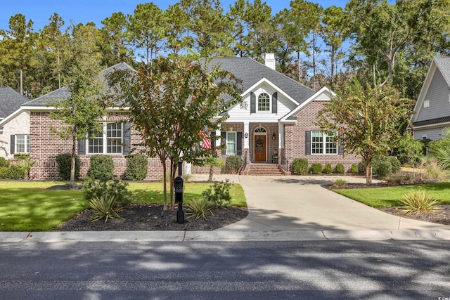 craftsman inspired home with a front yard