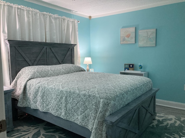 bedroom featuring a textured ceiling