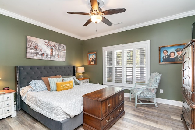 bedroom with ceiling fan, light hardwood / wood-style flooring, and ornamental molding