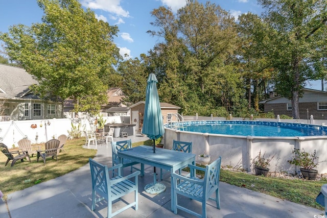 view of pool with a patio area